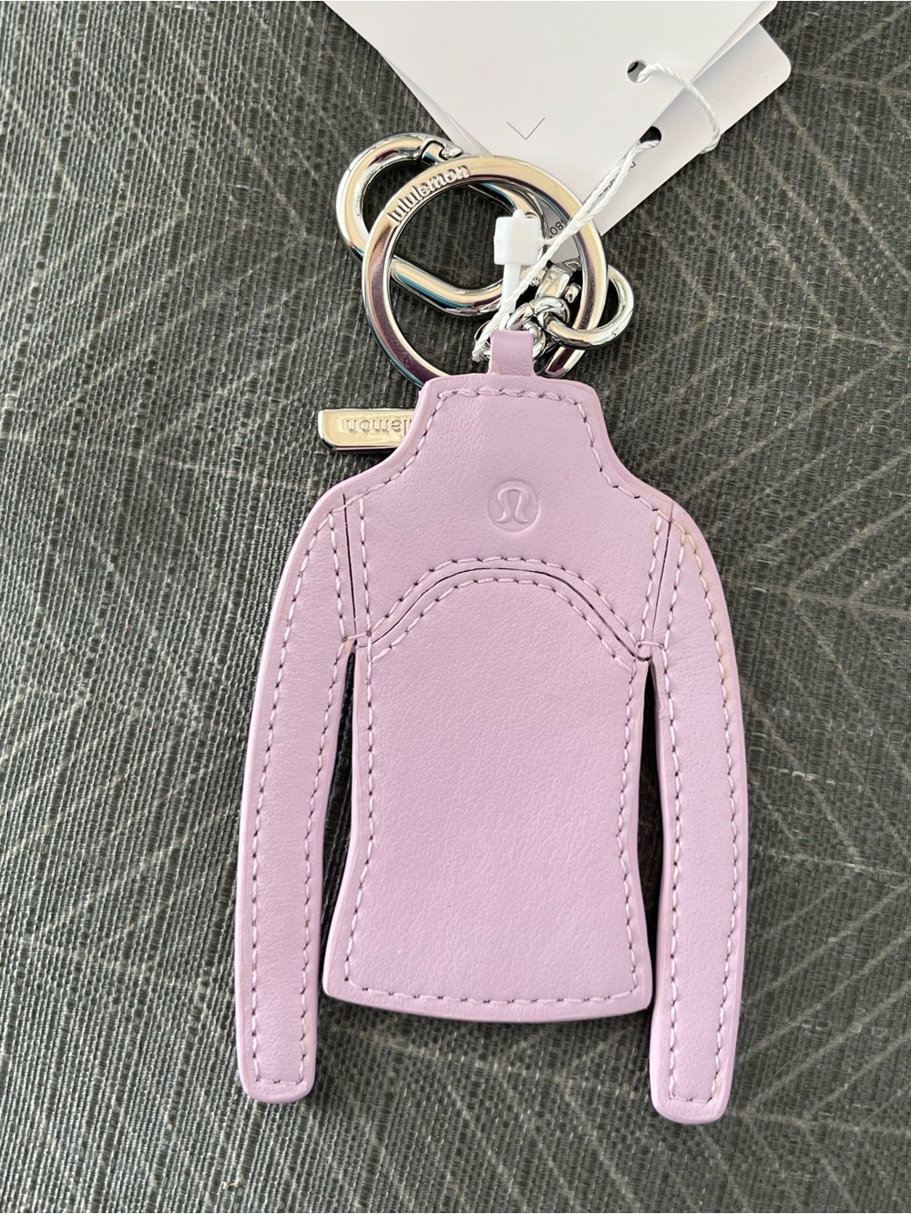 NWT Lululemon Lilac Scuba Jacket Keychain Accessory with Silver Hardware - Picture 2 of 3